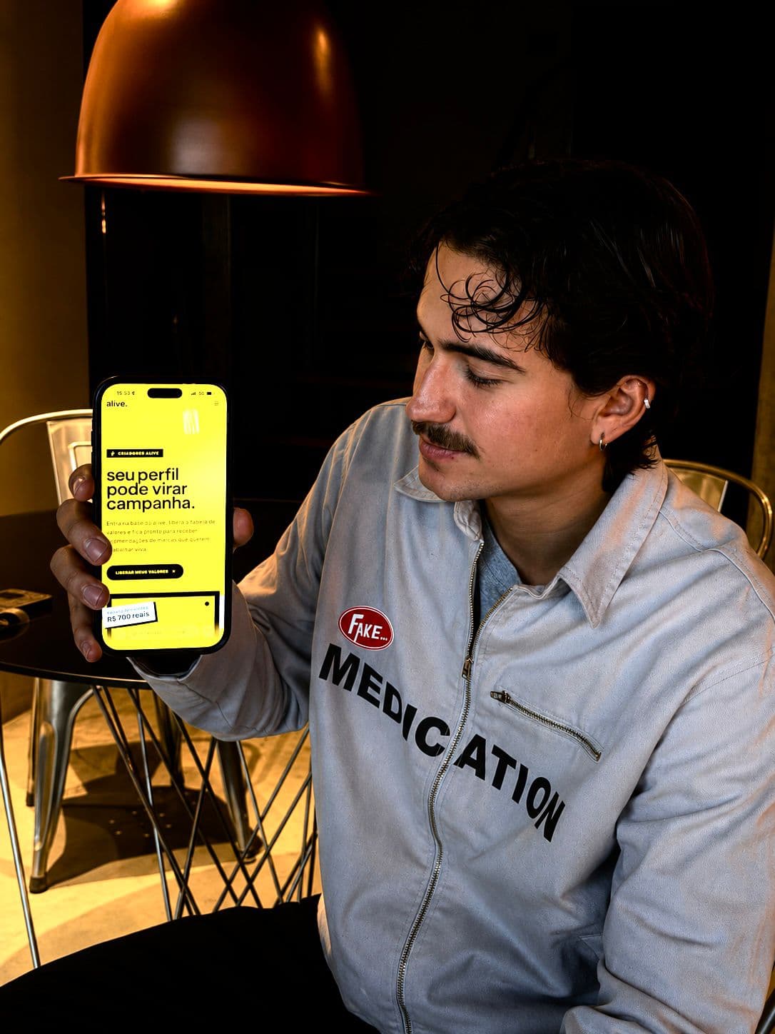 Creator mostrando a página de cadastro da Alive no celular